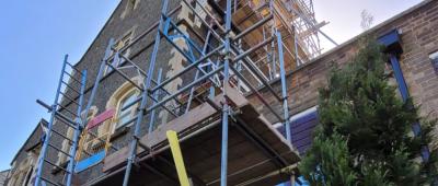A large amount of scaffolding in place for a commercial building project