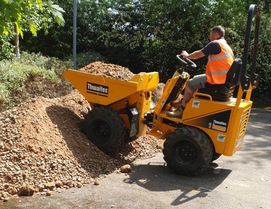 Moving building materials with a digger